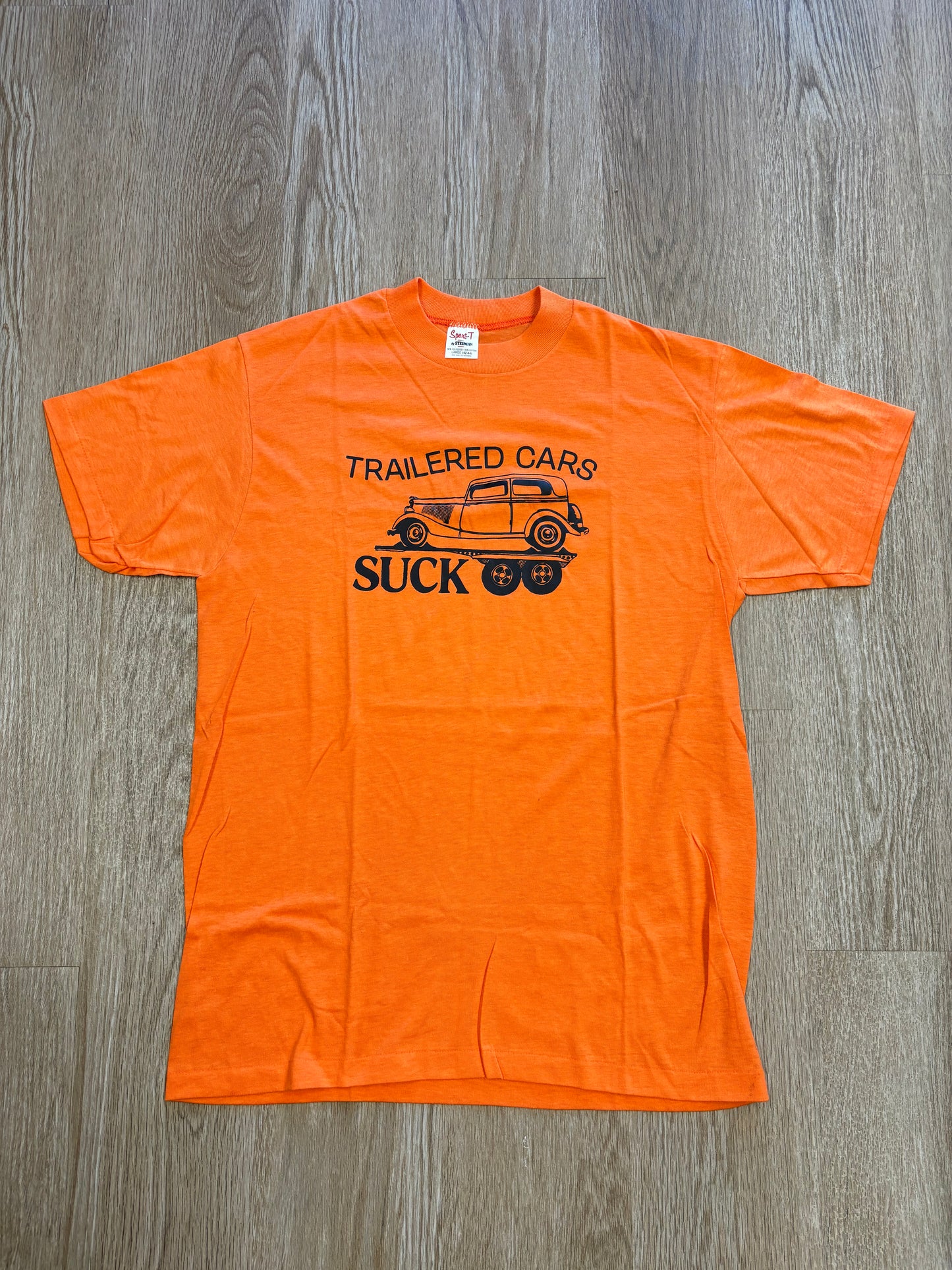 1981 “Trailered Cars Suck” Raunchy Tee